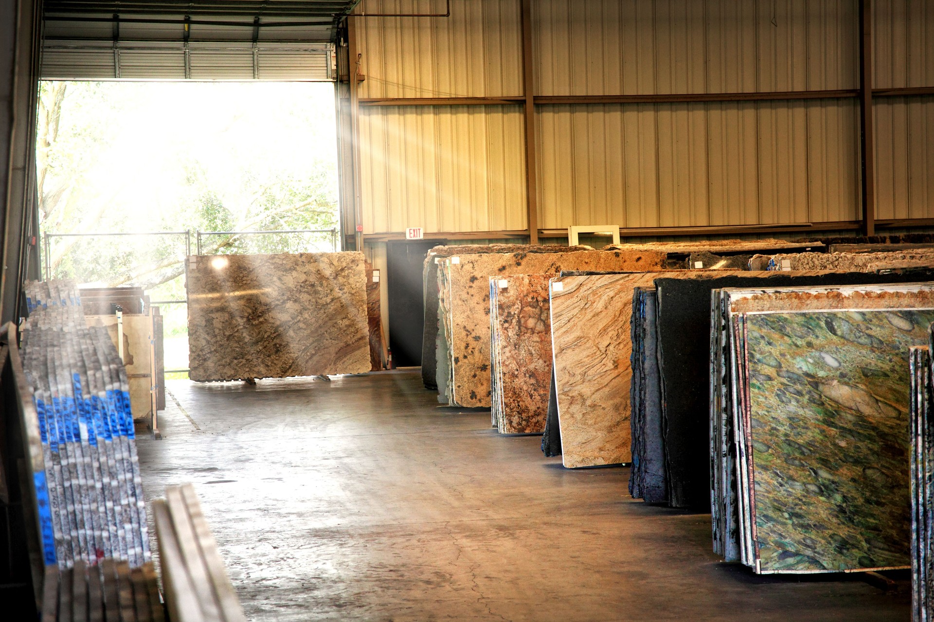 Various granite slabs at construction material store warehouse